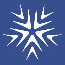 A white geometric snowflake-like design on a blue background, composed of symmetrical arrow shapes pointing inward.