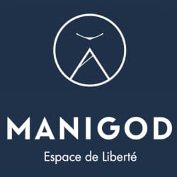 Logo of Manigod with white text on a dark blue background, featuring a minimalist emblem of a mountain within a circle above the words "Manigod Espace de Liberté.